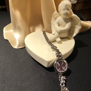 Quartz watch with silver Cats band